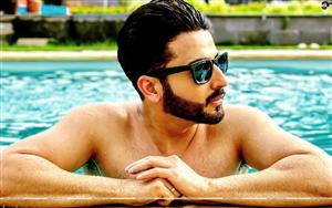 Television actor Dheeraj Dhoopar`s hot look at the pool side